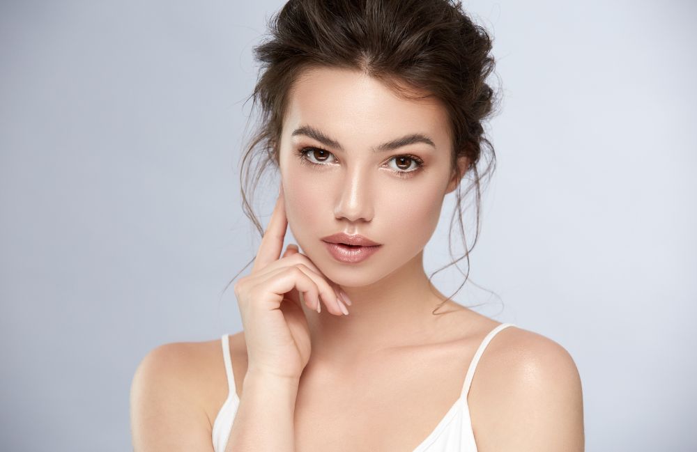 beautiful_cheeks Close-up of a woman's neck showing visible platysmal bands before treatment.