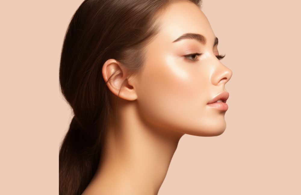 juvederm_today Close-up of a woman's neck showing visible platysmal bands before treatment.
