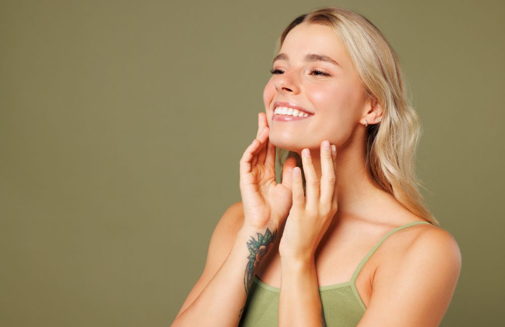 tmj-jaw-clenching-relief-touch Close-up of a woman's neck showing visible platysmal bands before treatment.