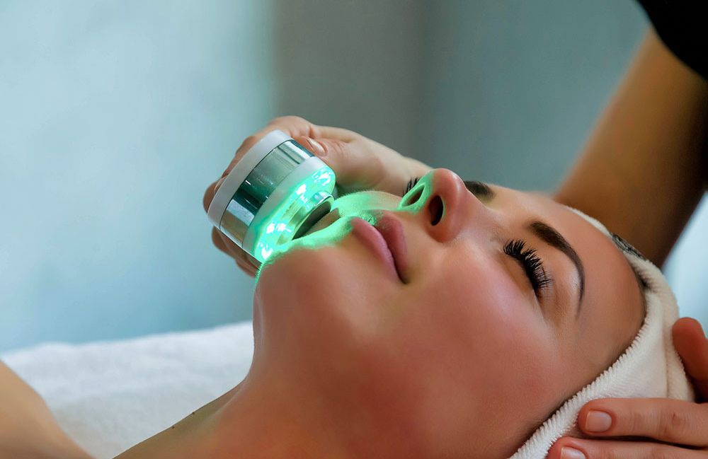 xtrac-laser-targeted-phototherapy Close-up of a woman's neck showing visible platysmal bands before treatment.